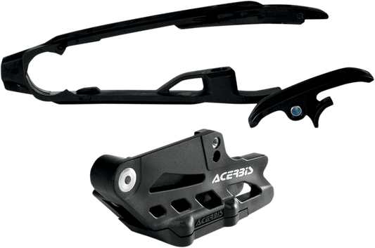 ACERBIS chain guide and slider kit for KTM bikes, black body with mounting hardware, designed for durability and performance.