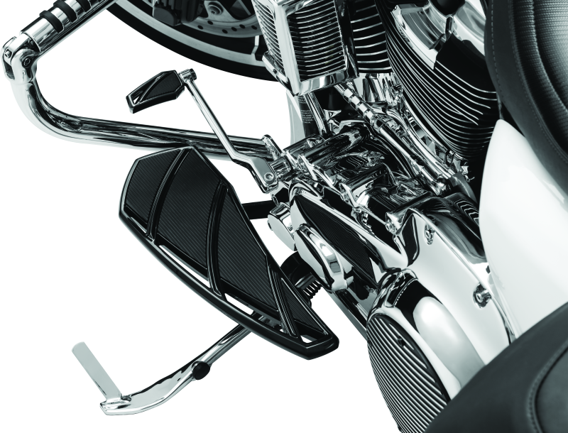 Kuryakyn Phantom black floorboards for Harley-Davidson motorcycles, featuring durable rubber grips and chrome accents.
