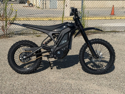 E Ride Pro SR electric dirt bike with 25KW motor, black frame, knobby tires, and 72V Samsung battery for off-road riding.