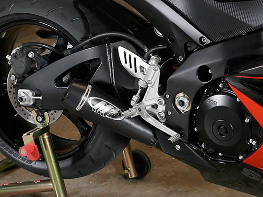 Black M4 GP slip-on exhaust for 2007-2008 Suzuki GSXR1000, detailed view of Bill's Exhausts product.
