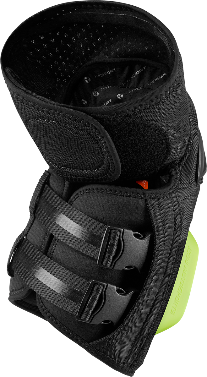 Black ICON Cloverleaf 2 Knee Pads CE armor by Bill's Exhausts, showing adjustable straps and protective padding in a natural stance.