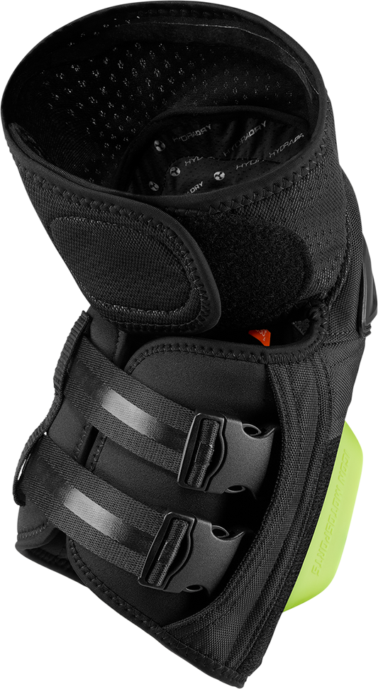Black ICON Cloverleaf 2 Knee Pads CE armor by Bill's Exhausts, showing adjustable straps and protective padding in a natural stance.