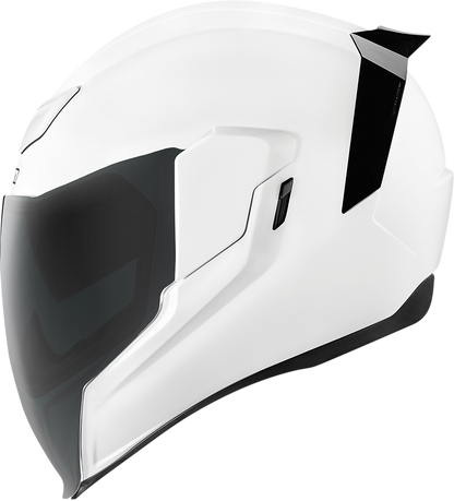 White ICON Airflite™ helmet with gloss finish, small size, displayed with clear visibility of the helmet's sleek design.