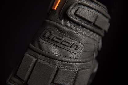 Black ICON Motorhead3™ CE gloves in 3XL size, featuring textured palm and reinforced knuckles for motorcycle riding comfort and protection.