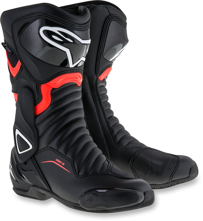 Black and red Alpinestars SMX-6 v2 Drystar motorcycle boots in US 10.5 / EU 45 with protective design and sturdy sole.