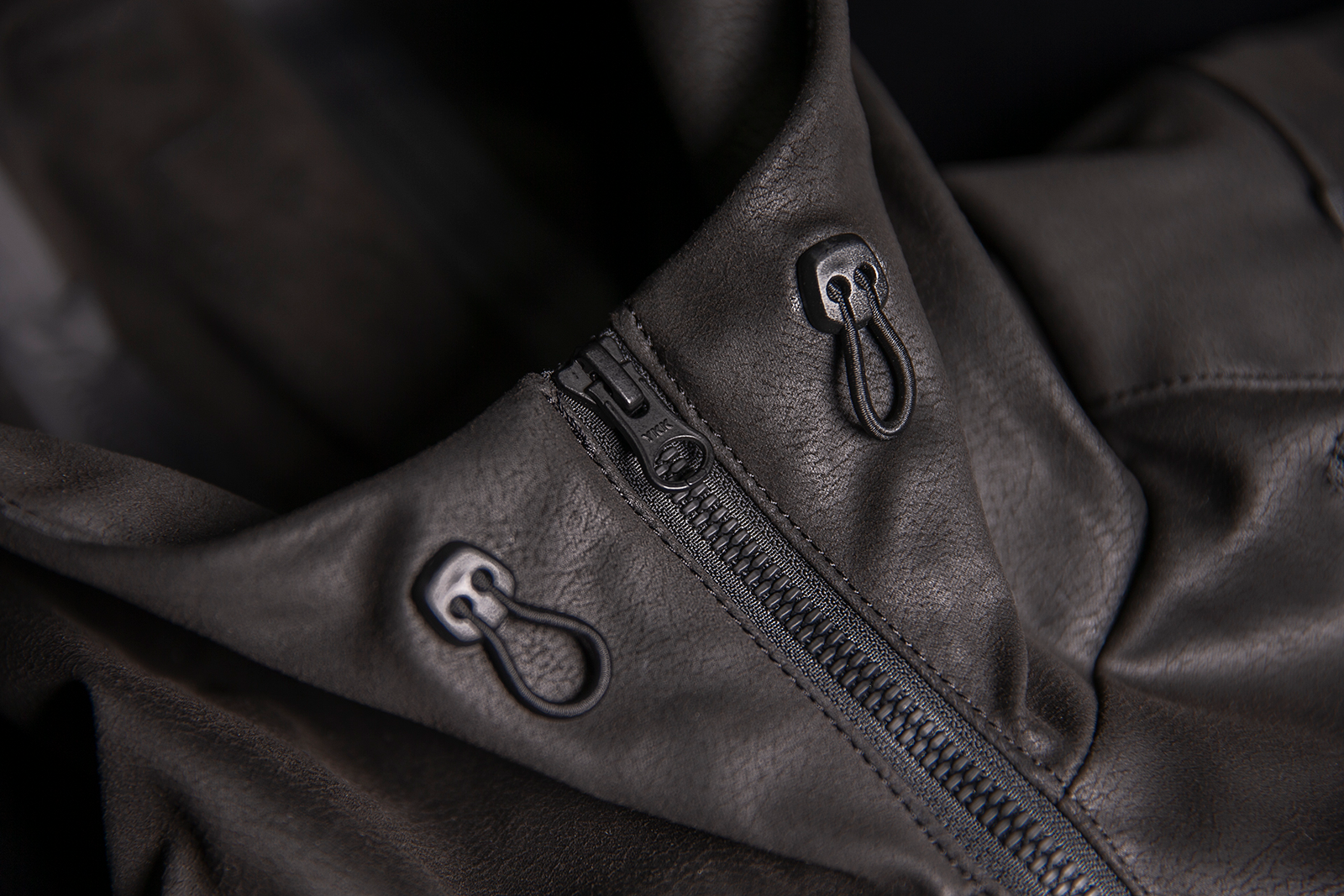 Black ICON Synthhawk Jacket in small size, featuring sleek design and detailed stitching, from Bill's Exhausts.