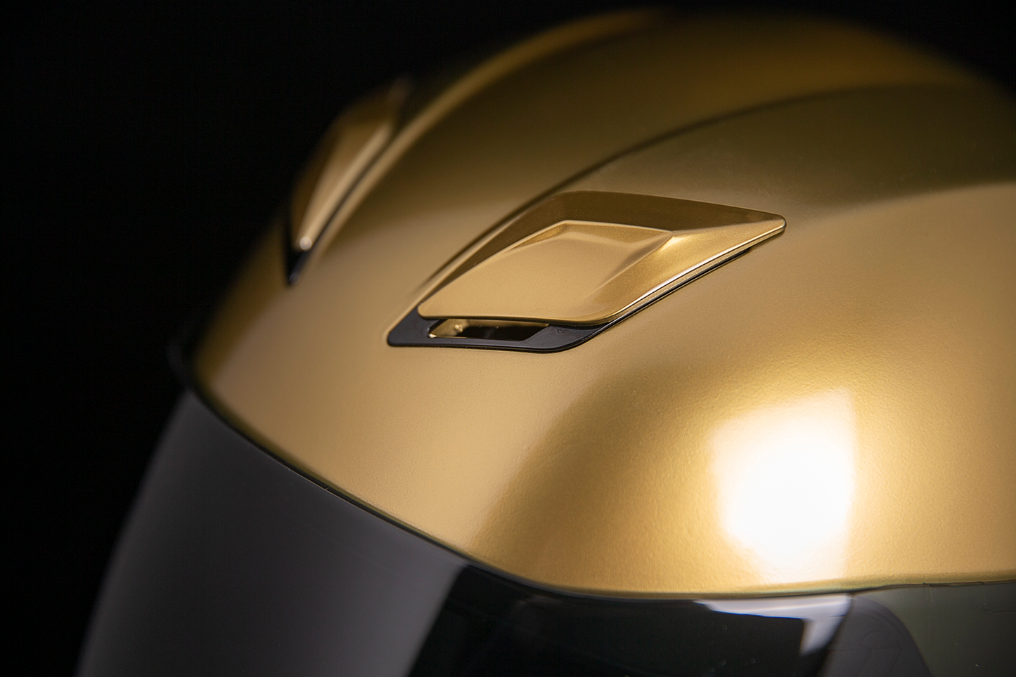 Bill's Exhausts ICON Airflite™ Helmet Jewel MIPS in gold, large size, showing the sleek helmet design and vibrant jewel finish.