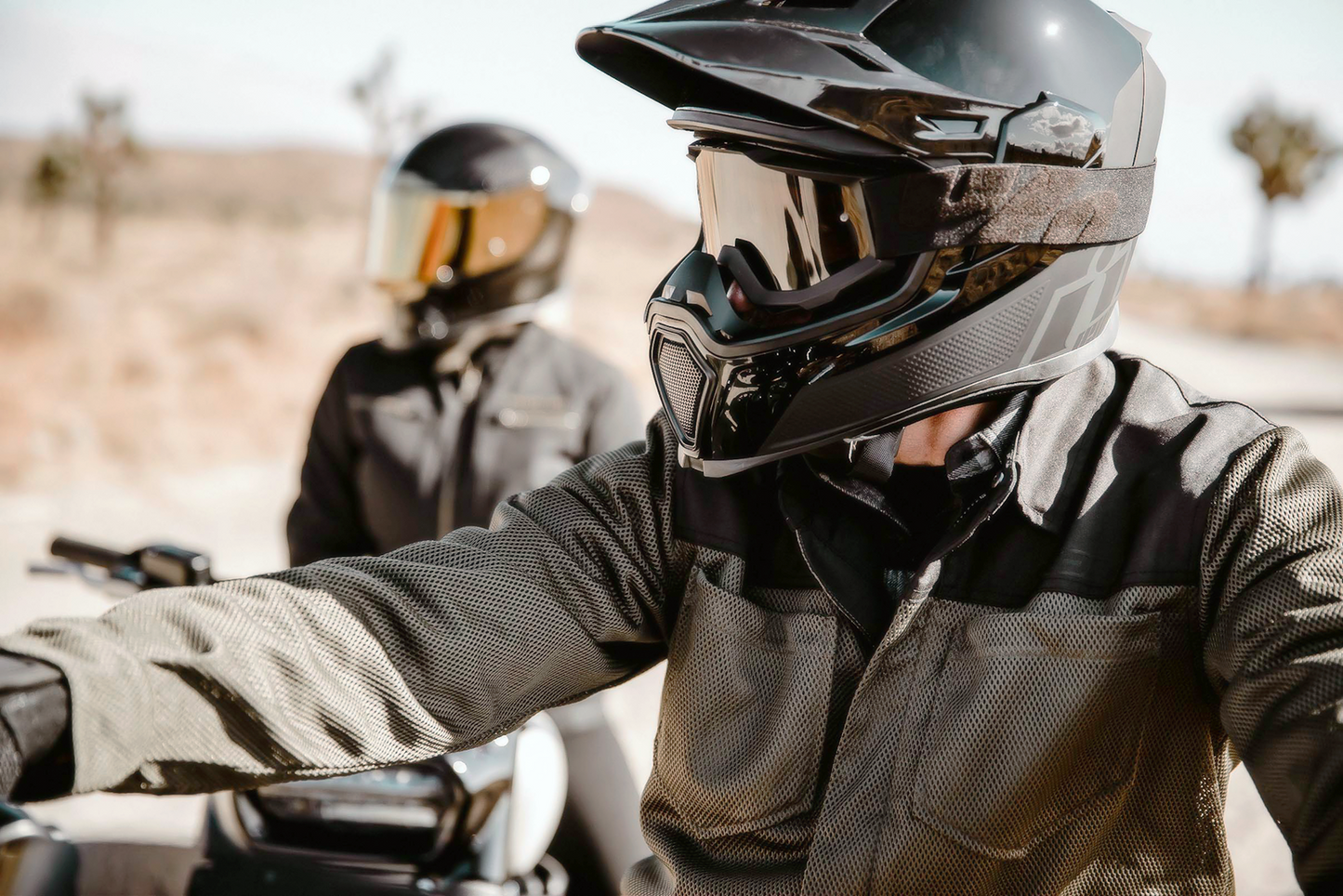 Black ICON Airflite™ Peak helmet part from Bill's Exhausts, showing the aerodynamic visor and sleek design.