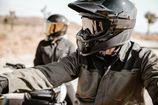 Black ICON Airflite™ Peak helmet part from Bill's Exhausts, showing the aerodynamic visor and sleek design.