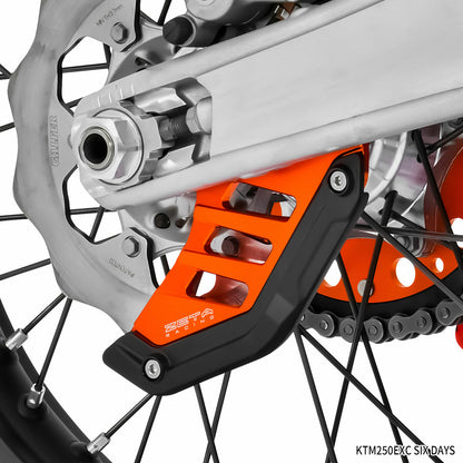 Orange ZETA ZE52-5103 rear disc guard protecting motorcycle rotor, made for ZETA bikes, with a sturdy, durable design.