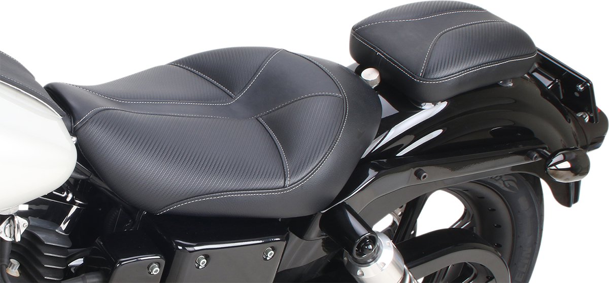 SADDLEMEN Dominator Pad 7-inch motorcycle seat showing durable black leather with detailed stitching and contoured design.