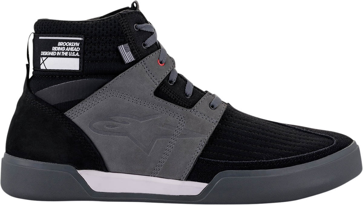 Alpinestars Primer black and gray shoes with laces, US size 10, showing side view with textured sole and stylish design.