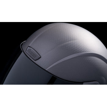 Silver ICON Airform MIPS helmet in 2XL size with Counterstrike design, featuring a sleek helmet profile and secure strap system.