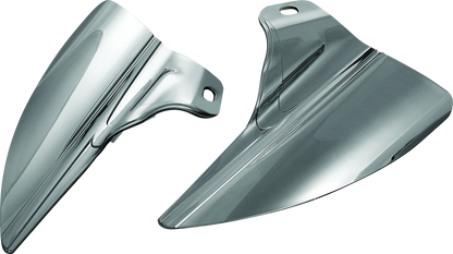 Kuryakyn Saddle Shields heat deflectors installed on Harley Davidson Touring motorcycle, showing shiny metal covers over the seat area.