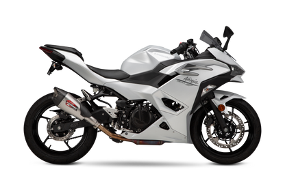 YOSHIMURA Street AT2 slip-on exhaust with carbon fiber end cap for motorcycle, showcasing sleek metal and carbon fiber finish.