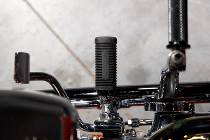 Black BILTWELL Norman foot pegs for motorcycles, featuring durable body construction and brand-specific design.