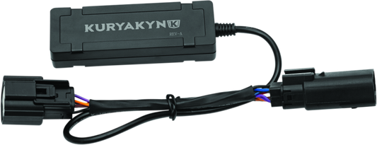 Kuryakyn 6-pin Molex turn signal regulator for Harley-Davidson motorcycles, shown connected with wiring harness.