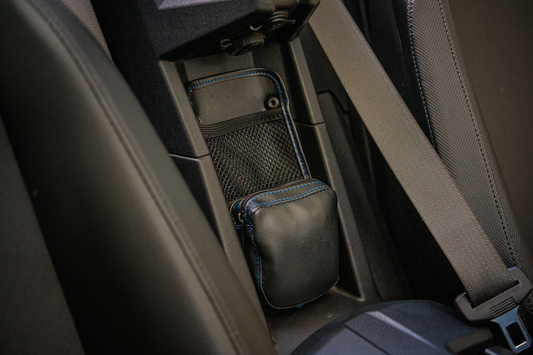 Bill's Exhausts SHOW CHROME Kaliber Engine Center Console Organizer in black with blue stitching, designed for engine storage.