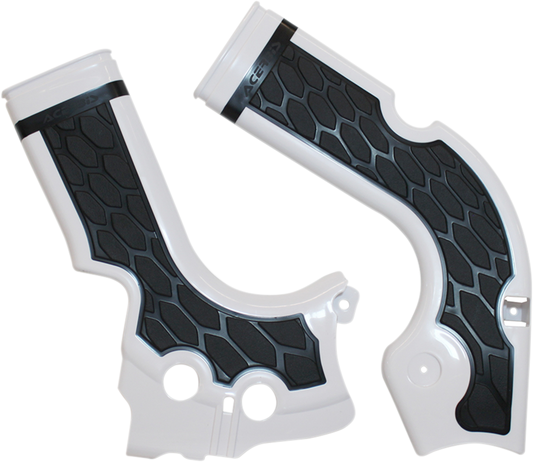 A set of Acerbis X-Grip frame guards in white and black for motorcycle protection, with detailed close-up view.