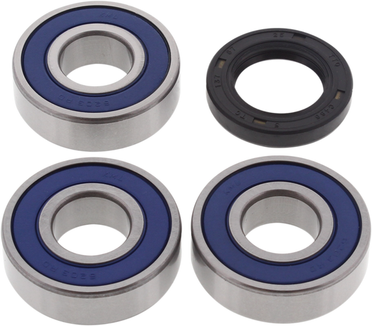 DRAG SPECIALTIES rear wheel bearing and seal kit showing bearings and seals for motorcycle wheel maintenance.
