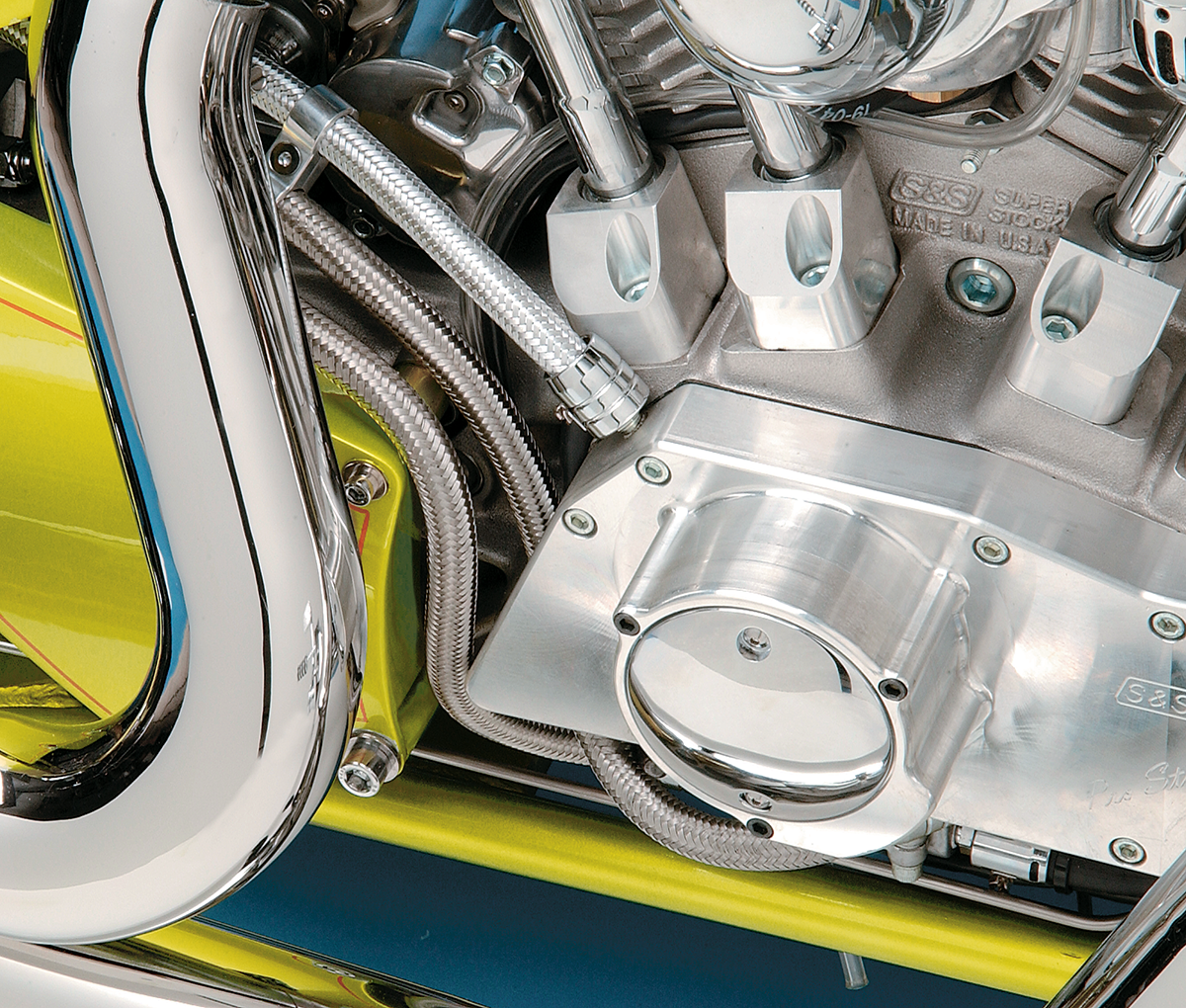 Stainless steel braided oil and fuel hose by Drag Specialties, 3/8 inch diameter, 6 feet long, with reinforced flexible construction.