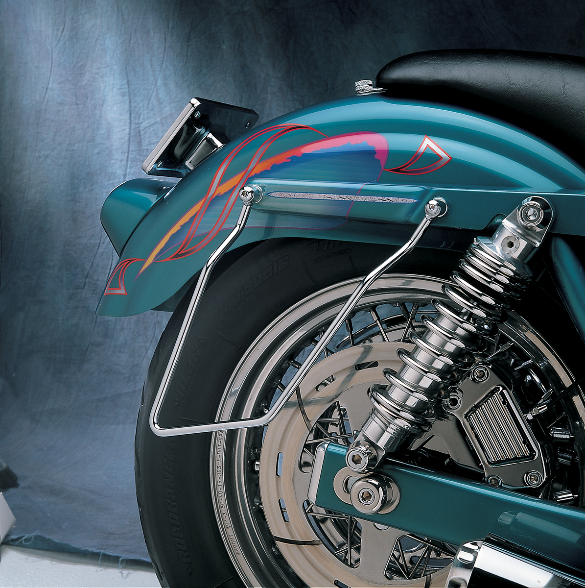 Drag Specialties FXR saddlebag support brackets for 1982-2000 Harley FXR models, durable metal mounting hardware.