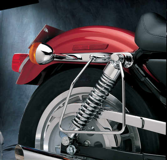 Drag Specialties Harley XL saddlebag support bracket for 1982-1993 motorcycle shown in black metal.