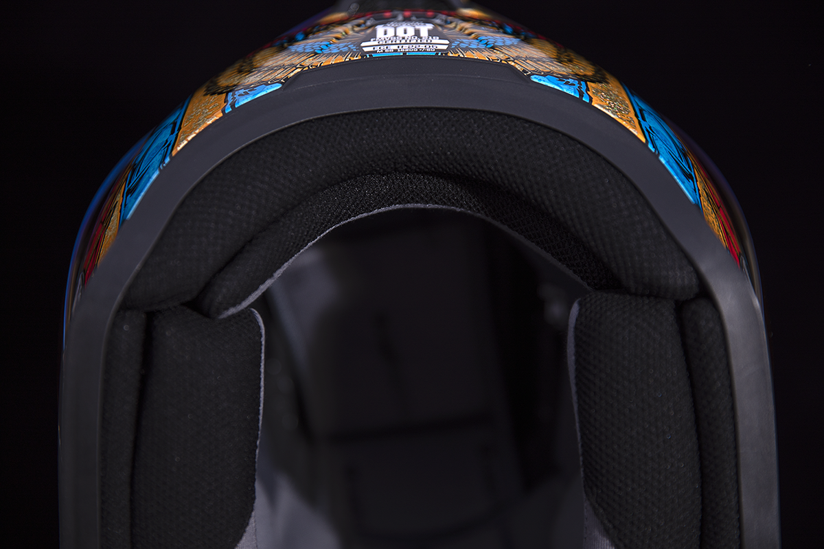 Gold ICON Airform™ Pharaoh helmet in small size with detailed design, featuring a sleek motorcycle helmet style.