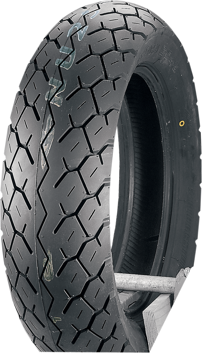 Bridgestone Exedra G546 rear motorcycle tire 170/80-15 77S with tread pattern and sidewall details, suitable for cruiser bikes.