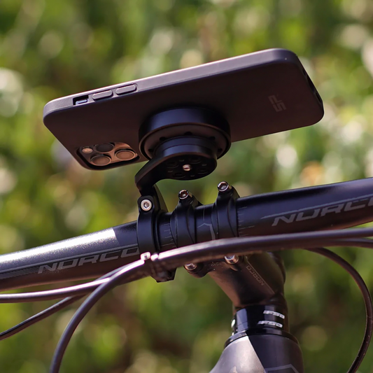 Black SP CONNECT Anti-Vibration Module SPC+ for phones, designed to reduce vibrations and improve stability, shown in the image.
