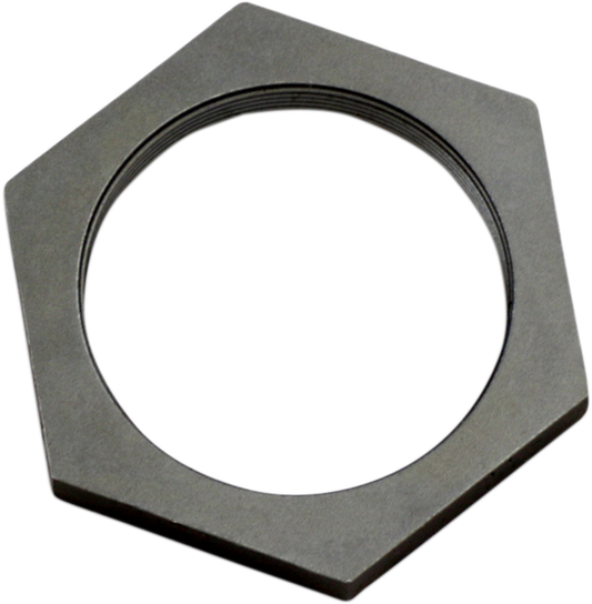 DRAG SPECIALTIES motorcycle mainshaft sprocket nut 33-0303-SC1 installed on drive system, metal component with threads and locking features.