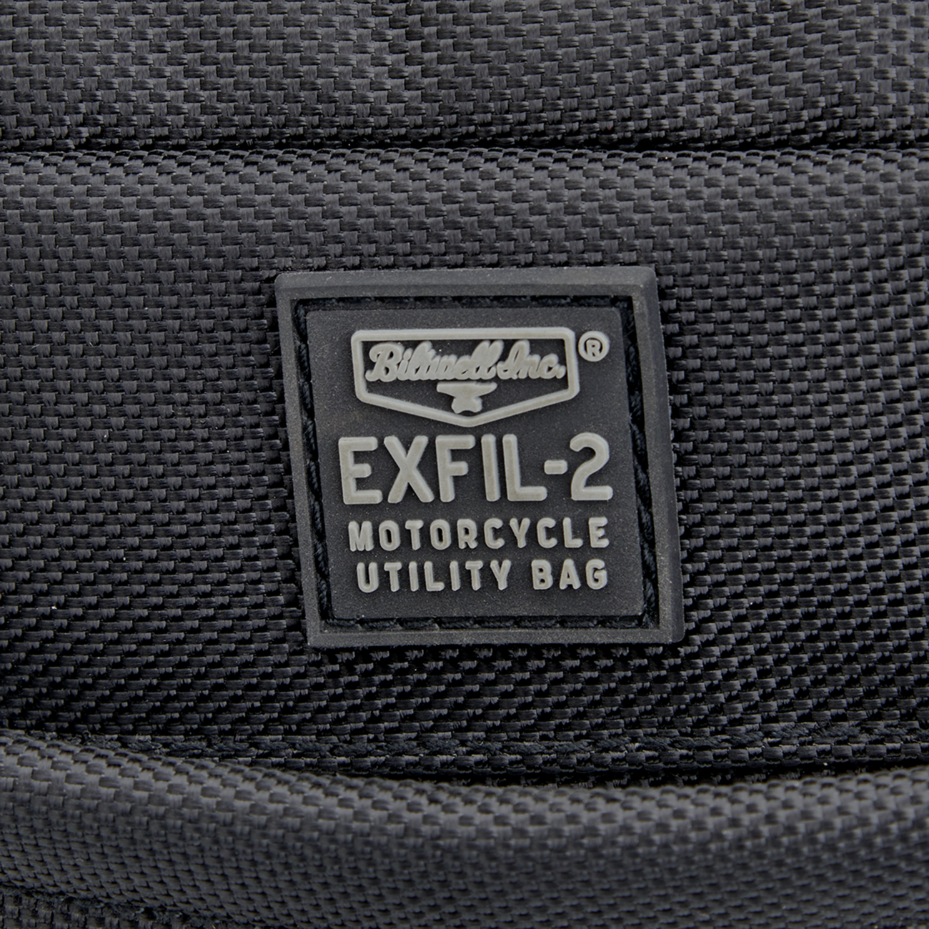 Black Biltwell EXFIL-2 Mini Tank Bag on motorcycle, compact storage solution with durable design, by Bill's Exhausts.
