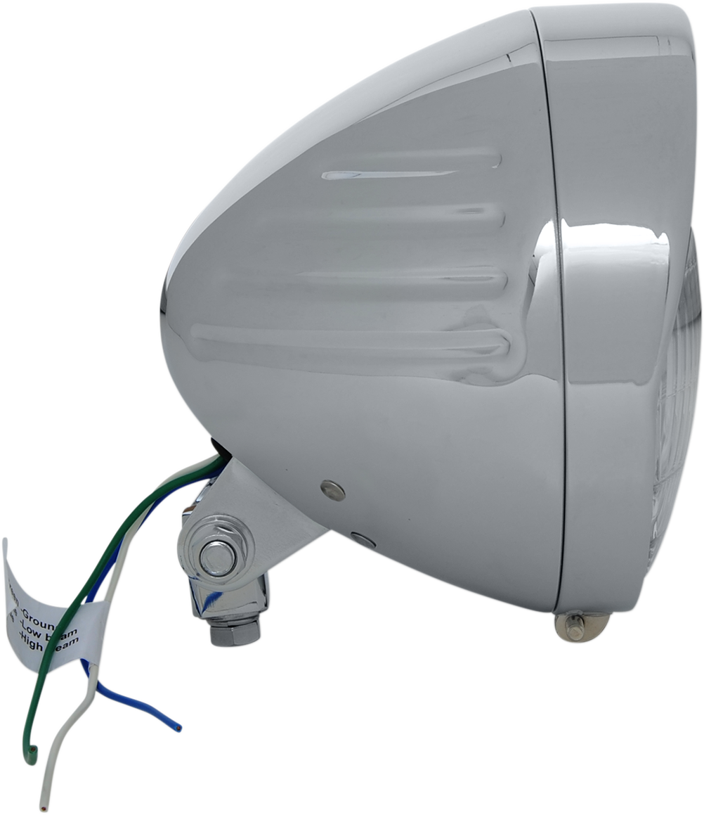 Drag Specialties 6.5-inch headlight with visor, grooved model 20-0338-BXLB1, featuring a chrome finish and integrated visor.