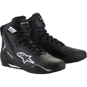 Alpinestars Stella Faster-4 black motorcycle shoes with reinforced soles and sporty design, US size 7, on a neutral background.
