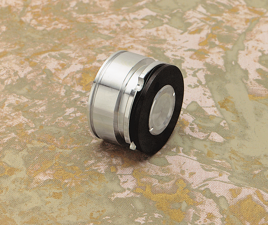 DRAG SPECIALTIES rear caliper piston for FL motorcycle models, part number 44129-73-BX, shown in close-up.