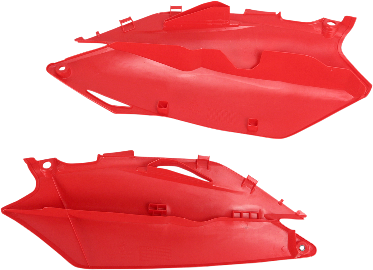 Red ACERBIS side panels for motorcycle body, featuring sleek design and vibrant color, compatible with Bill's Exhausts models.