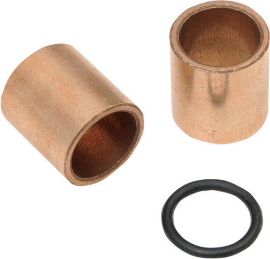 Close-up of DRAG SPECIALTIES transmission cover bushings for Harley-Davidson, showing the black rubber components.