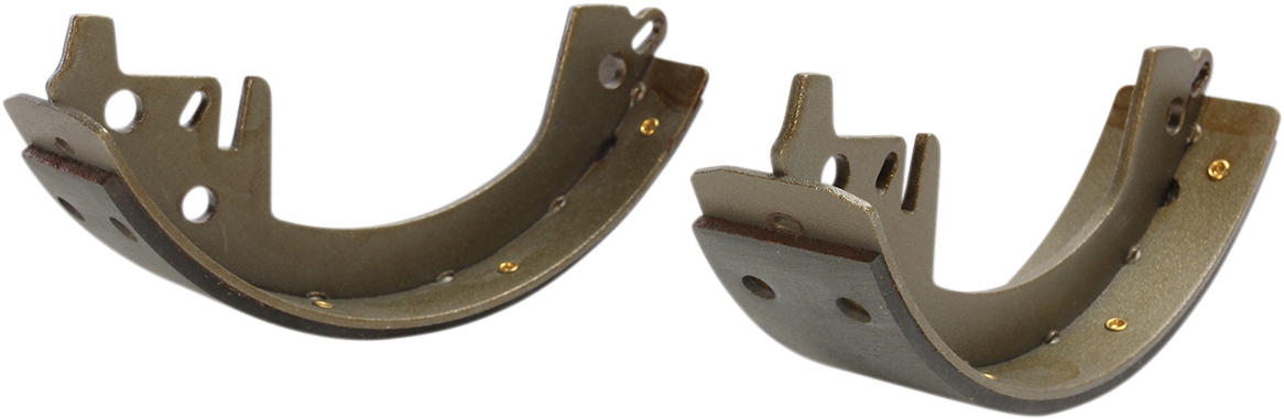 Rear brake shoes by Drag Specialties for '63-'72 Big Twin motorcycle, part #060112SCPFXBX, with visible brake lining and metal frame.