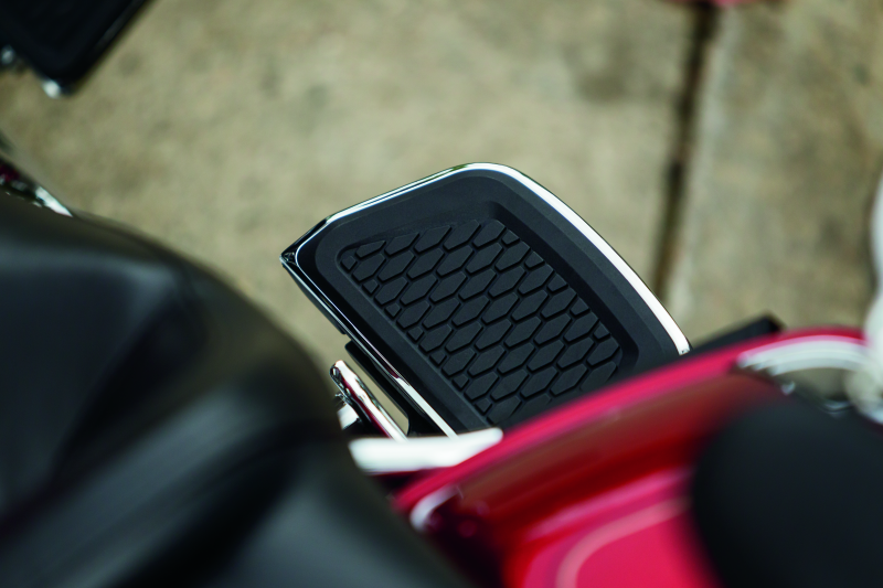Chrome Kuryakyn Hex Passenger Board Inserts for Harley Davidson 2008-2009 models, with part number 5902, mounted on passenger footboards.