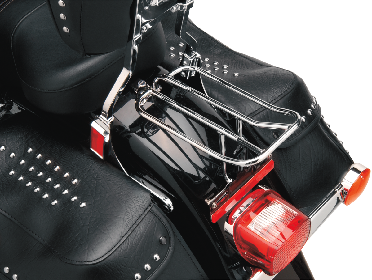 Chrome luggage rack for Harley FLST motorcycle by Drag Specialties, featuring a sturdy design and chrome finish.