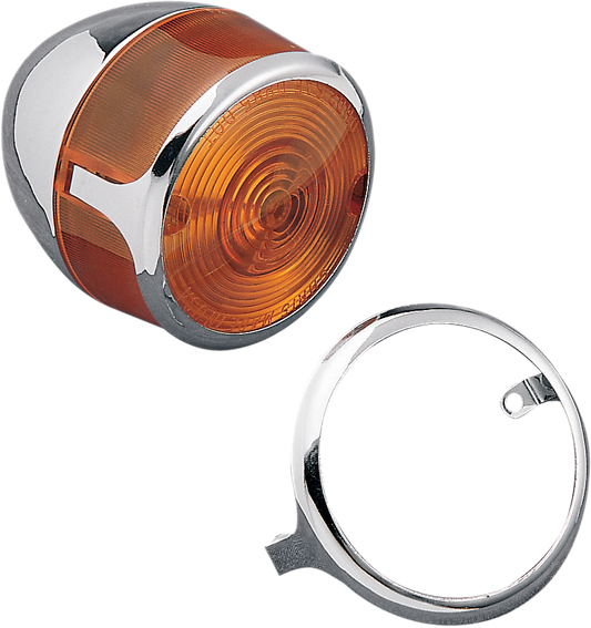 Chrome turn signal lens trim for motorcycles by DRAG SPECIALTIES, shown on a vehicle with a shiny finish.