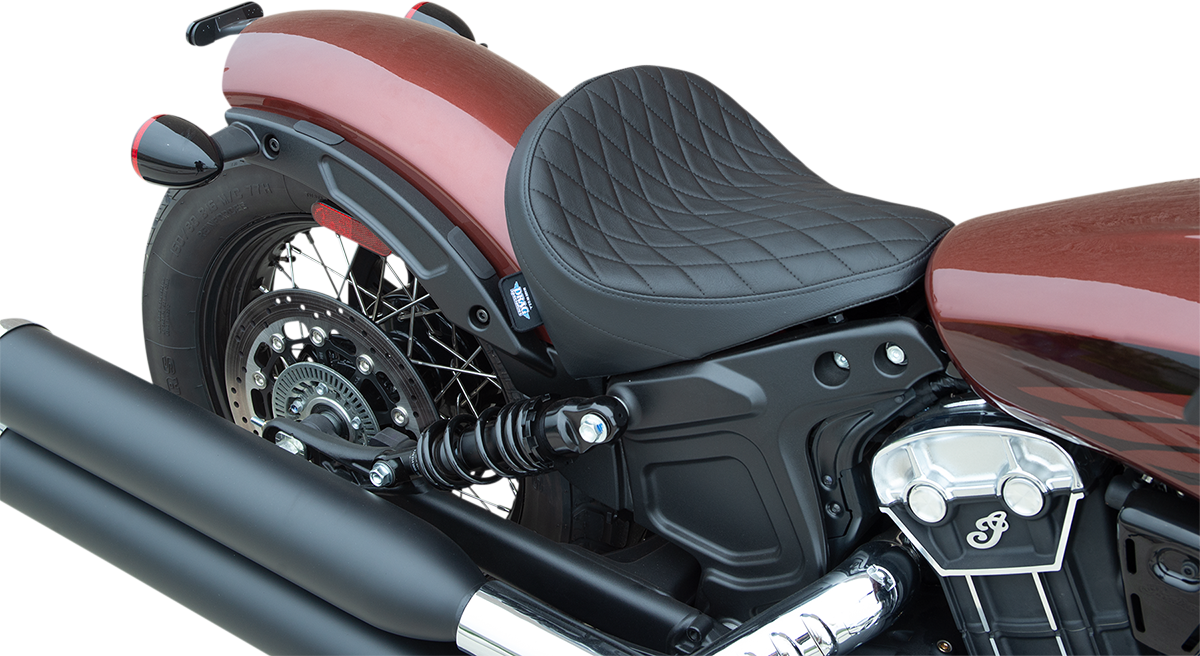 Black diamond vinyl solo seat by Drag Specialties Seats, designed for motorcycle comfort and style.