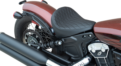 Black diamond vinyl solo seat by Drag Specialties Seats, designed for motorcycle comfort and style.