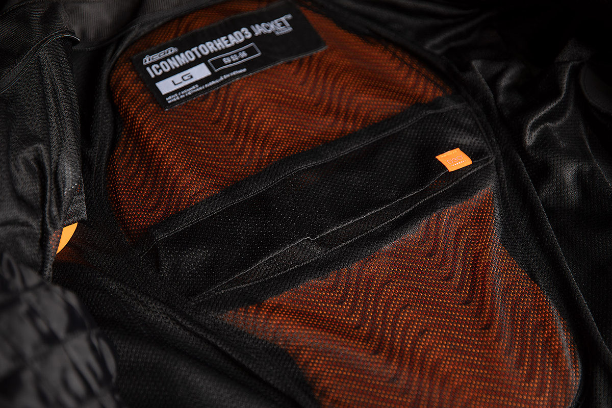 Black ICON Motorhead3™ jacket in XL size, featuring a sleek design and durable fabric, displayed on a plain background.