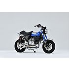 Over Racing Spiral Full Titanium Exhaust for Honda Monkey 125 and DAX 125, showcasing the sleek, high-performance exhaust system.