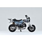 Over Racing Spiral Full Titanium Exhaust for Honda Monkey 125 and DAX 125, showcasing the sleek, polished exhaust pipe design.