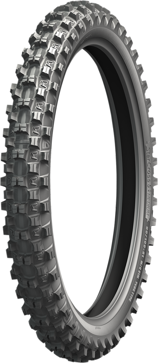 Michelin StarCross 5 Medium front tire with 70/100-19 size and 42M load rating, shown on a motorcycle wheel.