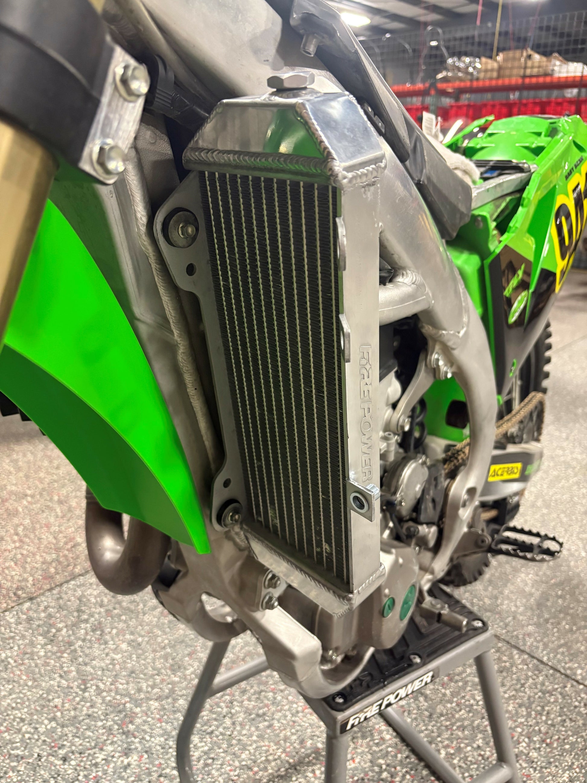 FIRE POWER TRS-R-140L radiator for Kawasaki motorcycle, high-performance aluminum cooling solution, shown from the left side