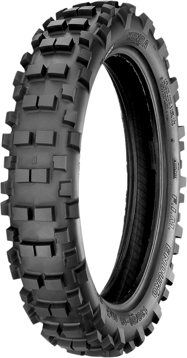 Kenda K779 Gauntlet rear tire for hard enduro, 140/80-18 size, mounted on motorcycle wheel with knobby tread pattern.