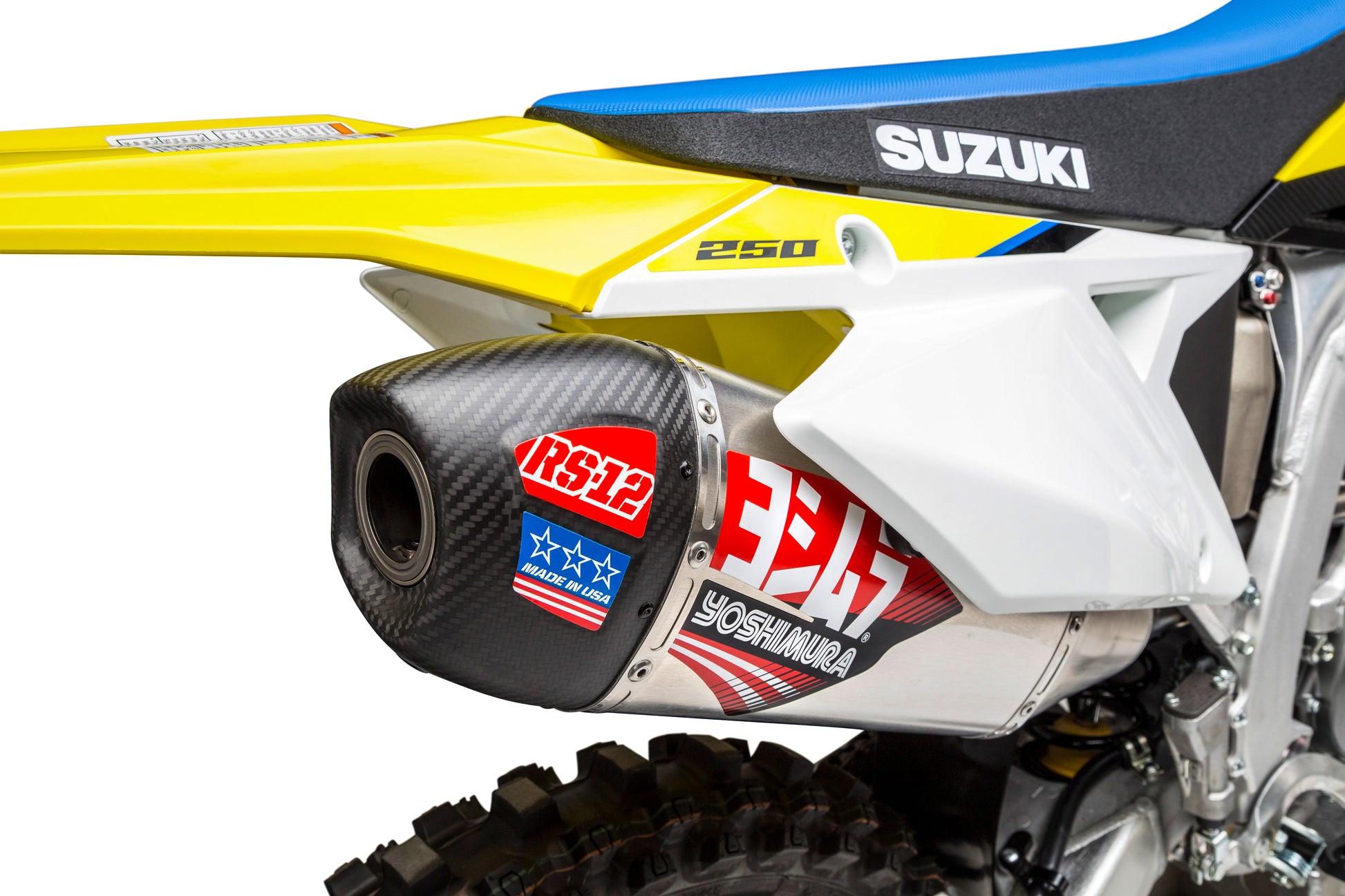 YOSHIMURA RS-12 Signature Series dirt bike exhaust system with aluminum and carbon fiber components, shown installed on a dirt bike.